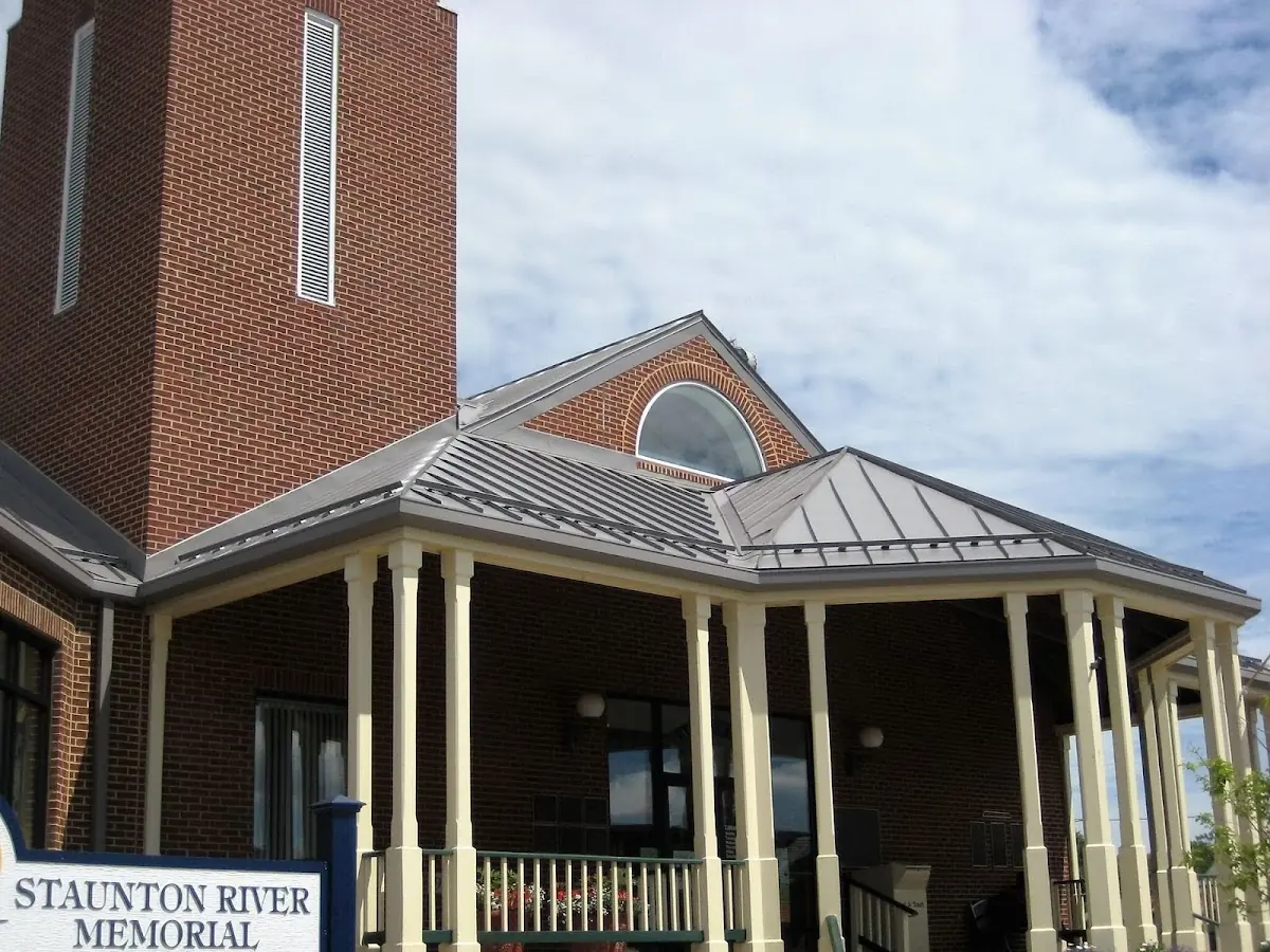 Skilled roofing craftsmen working on a residential roof in Hickory Bluff